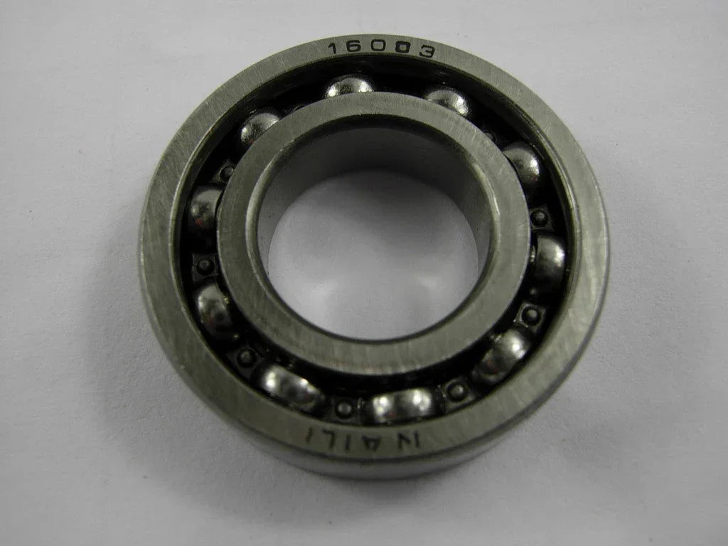 Close-up of a 16003 bearing from Vendor-Unknown, showing its metal outer ring and rolling elements for machinery parts.