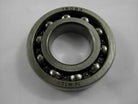 Close-up of a 16003 bearing from Vendor-Unknown, showing its metal outer ring and rolling elements for machinery parts.