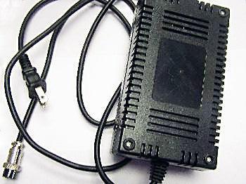 24V charger with 3-prong female plug, compatible power adapter for electronic devices, shown with cord and plug details