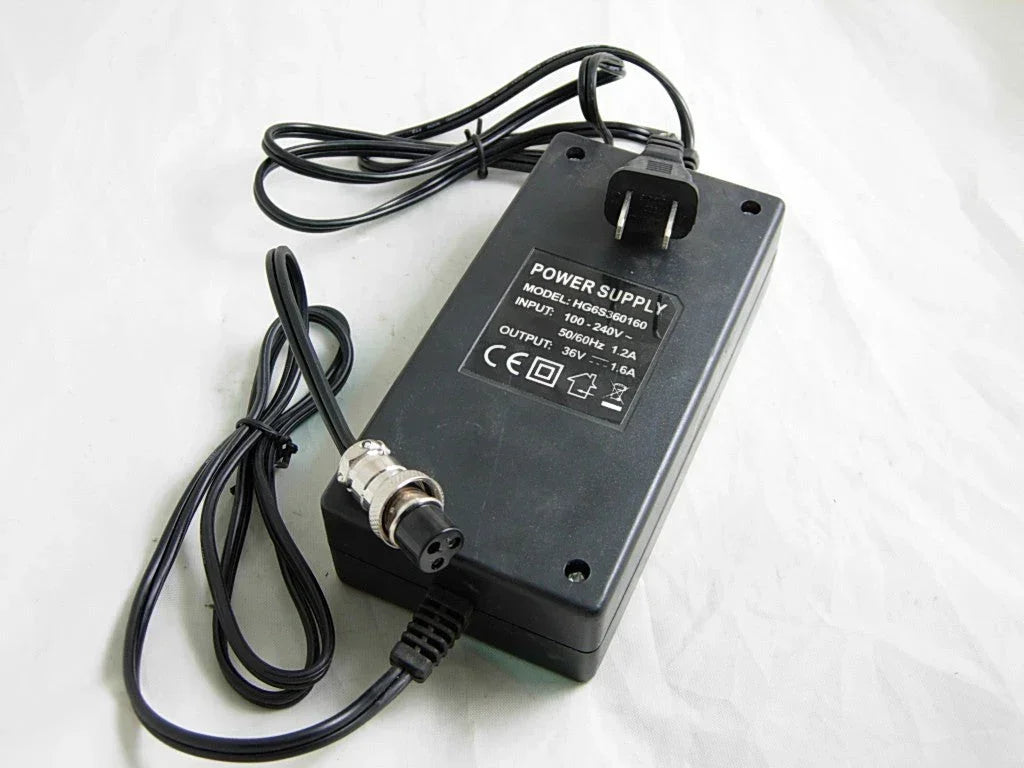 36V charger with 3-prong female plug, compatible with electronic devices, from vendor-unknown parts category.