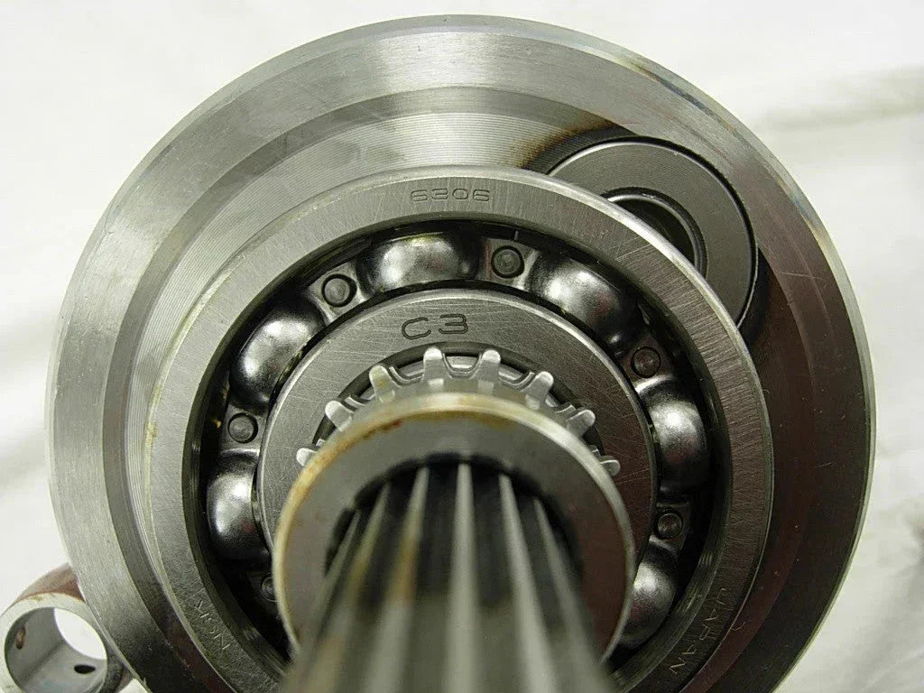Crankshaft for Yamaha CF250 GY6 250cc scooter, automotive engine part with metal components visible.