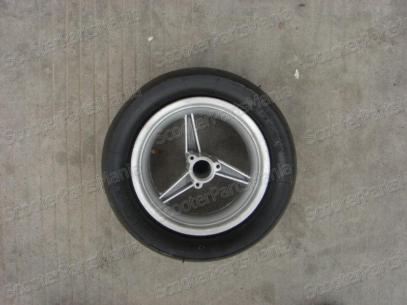 Rear pocket tire with rim for 47-49CC mini moto, suitable for 2-stroke engines, showcasing durable rubber and rim design.