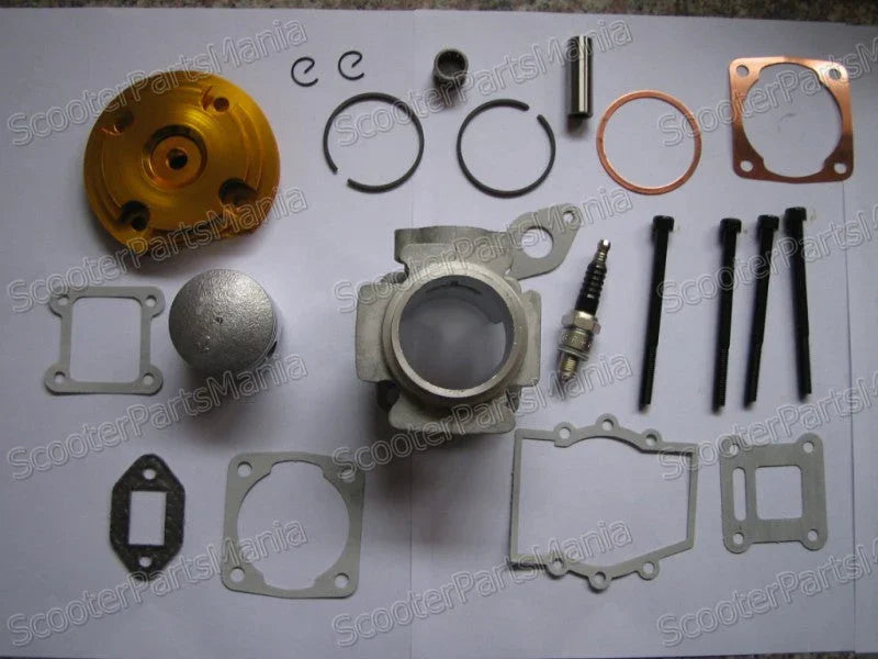 49cc 2-stroke engine rebuild kit with cylinder, gaskets, piston, spark plug, and bolts