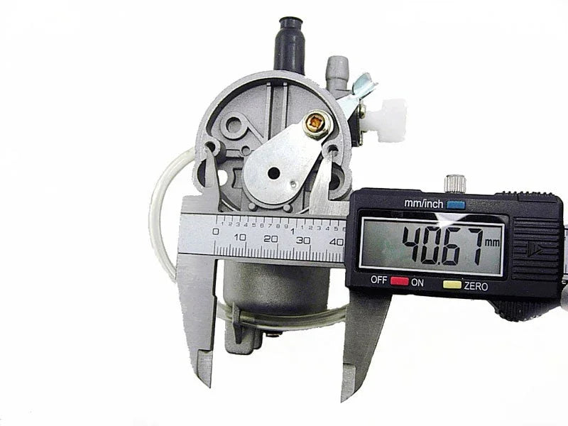 Digital caliper measuring a metal mechanical part showing 40.67 mm on a white background