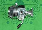 Mini 49cc 2-stroke performance carburetor for pocket bikes, compact engine part with metal components and adjustable settings.