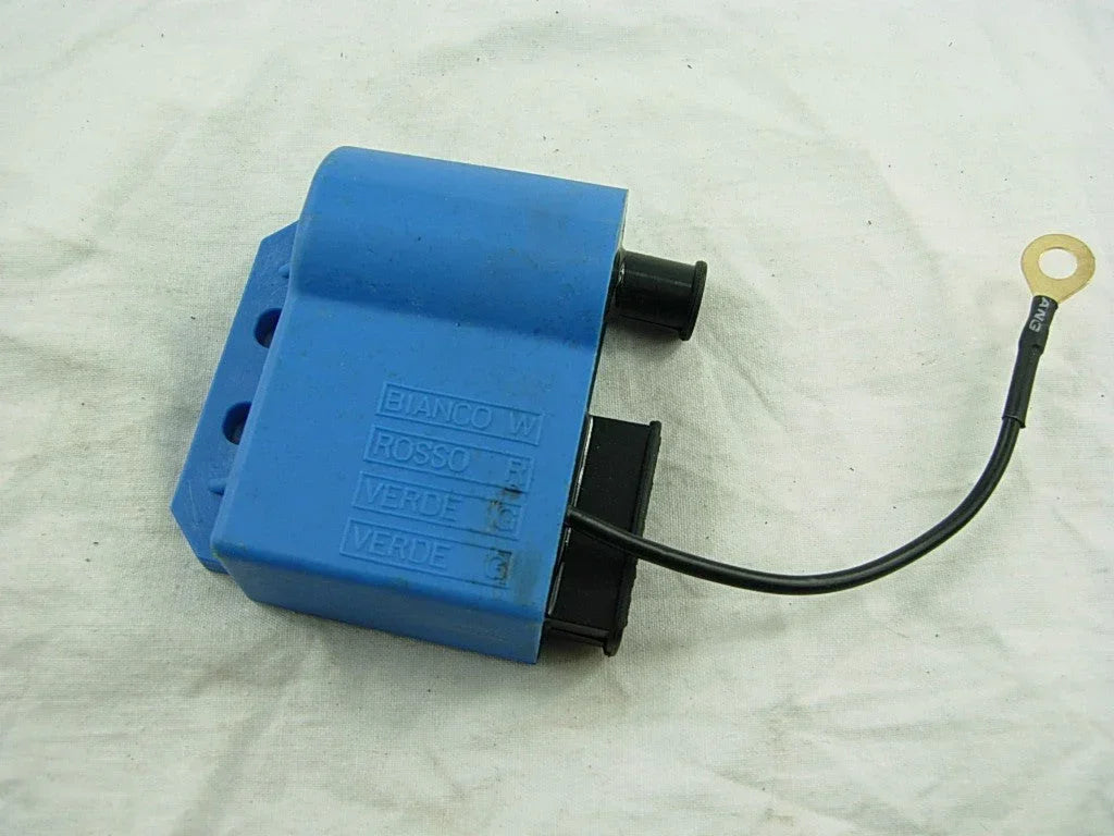 Ignition coil assembly for VESPA motorcycles, showcasing a universal accessory design with detailed wiring and connectors.
