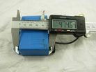 Ignition coil assembly for VESPA motorcycles, featuring a durable design and universal compatibility for various models.